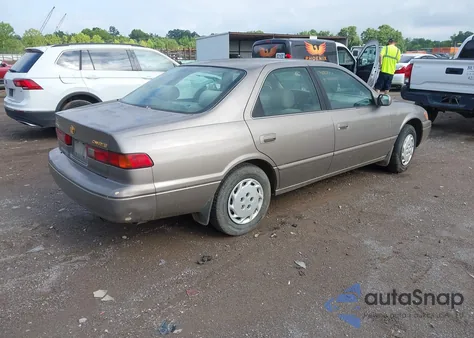1999 Toyota Camry Le from USA, damaged, VIN 4T1BG22K3XU871911